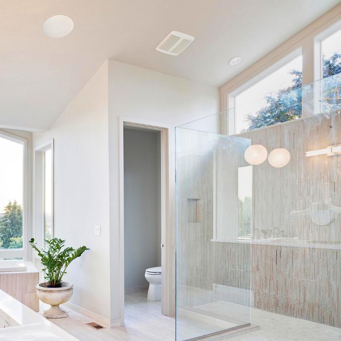 bathroom with wireless speakers in the ceiling